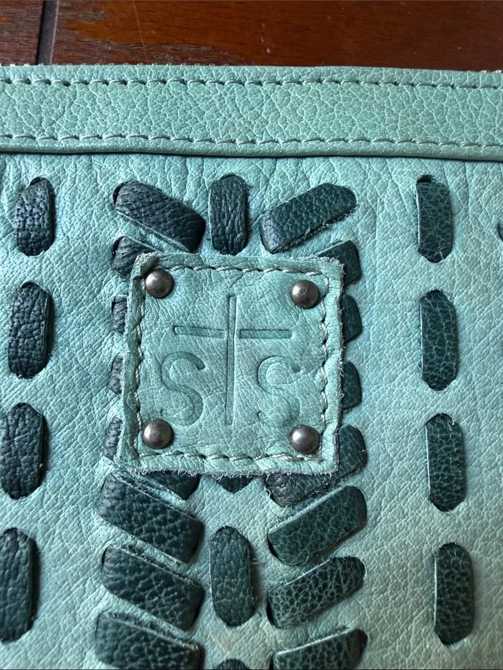STS Braided Accent Light Green Leather Zip Wristlet Clutch